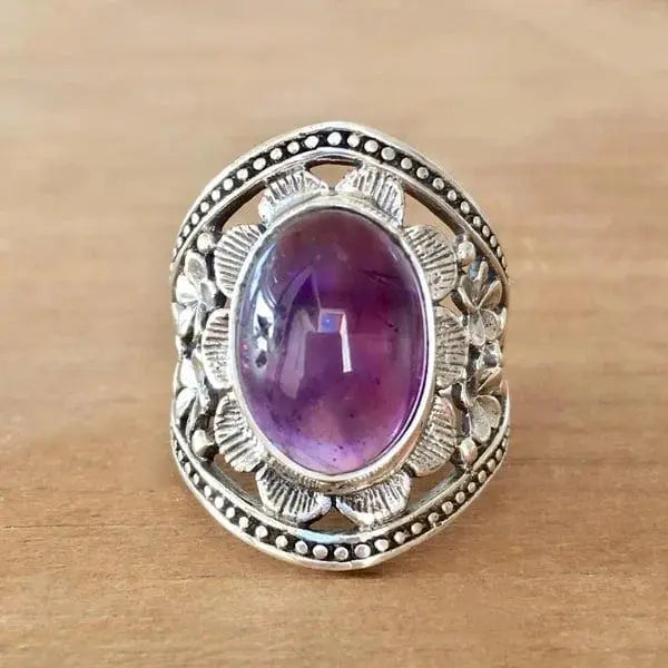 Blumenring mit violettem Edelstein